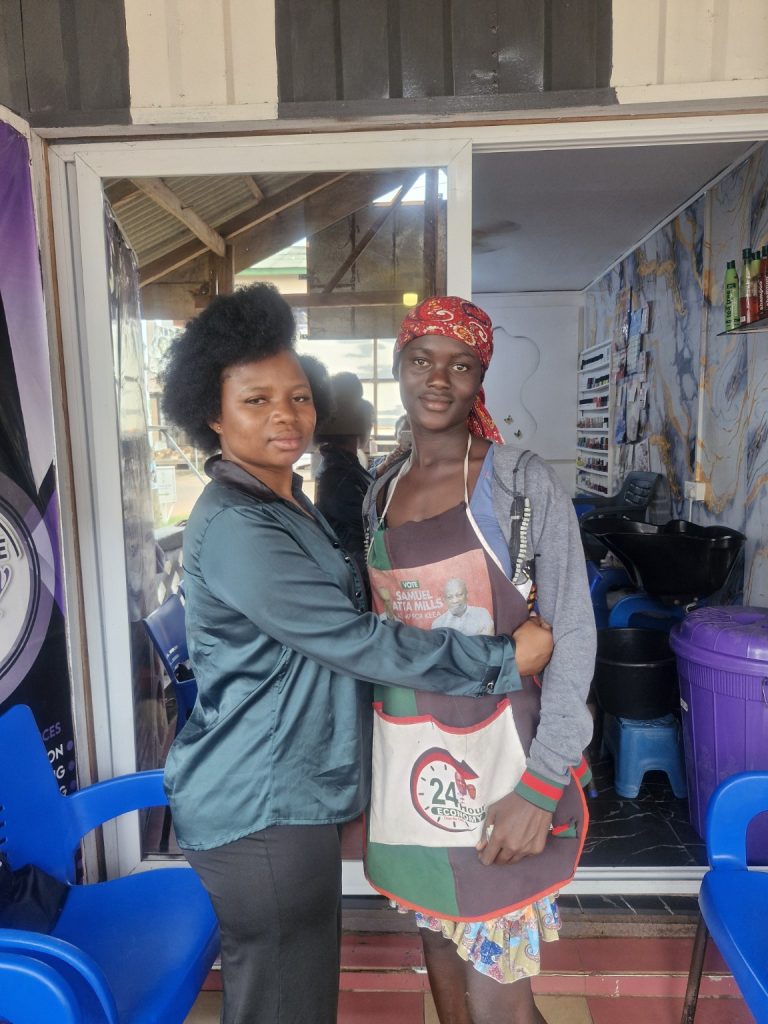 Teenage mother receiving vocational skills support through the Emerald Atibire Foundation.